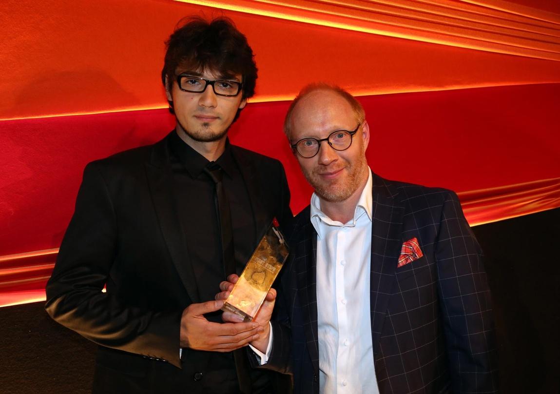 Sebastian Thaler und Simon Schwarz nahmen stellvertretend für Studentenoscargewinner Patrick Vollrath den First Steps Award in der Kategorie "Mittellanger Spielfilm" entgegen