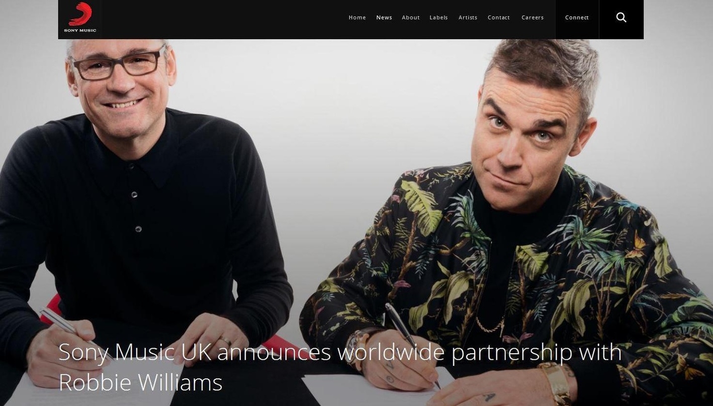 Gaben den neuen Deal auf der Homepage von Sony Music bekannt: Jason Iley (Chairman & CEO Sony Music UK, links) und Robbie Williams