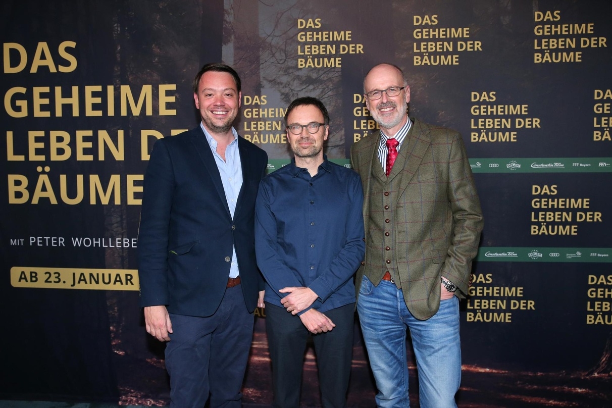 Produzent Friedrich Oetker, Regisseur Jörg Adolph und Protagonist Peter Wohlleben bei der Premiere von "Das geheime Leben der Bäume"