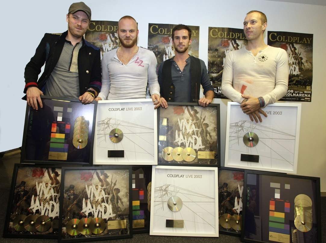 Im Edelmetallrausch: Johnny Buckland, Will Champion, Guy Berryman und Chris Martin von Coldplay