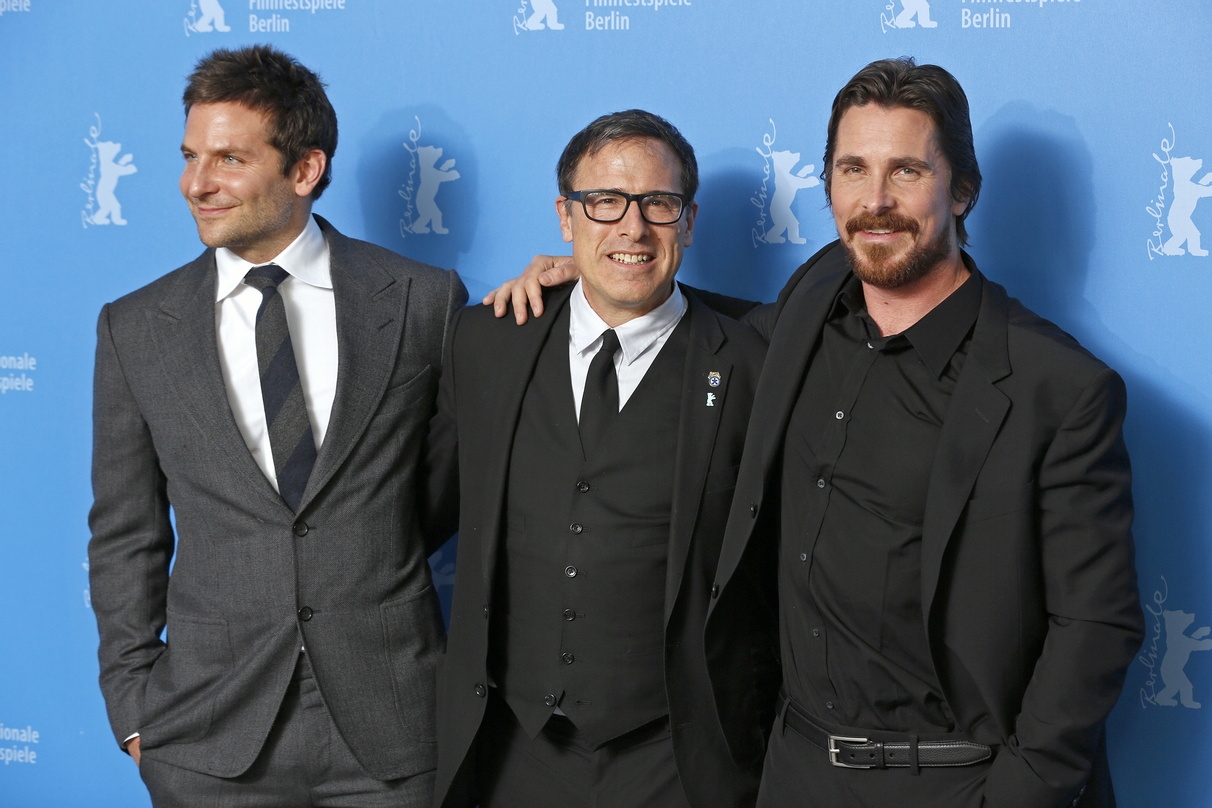 David O. Russell (Mitte) mit seinen "American Hustle"-Stars Bradley Cooper und Christian Bale