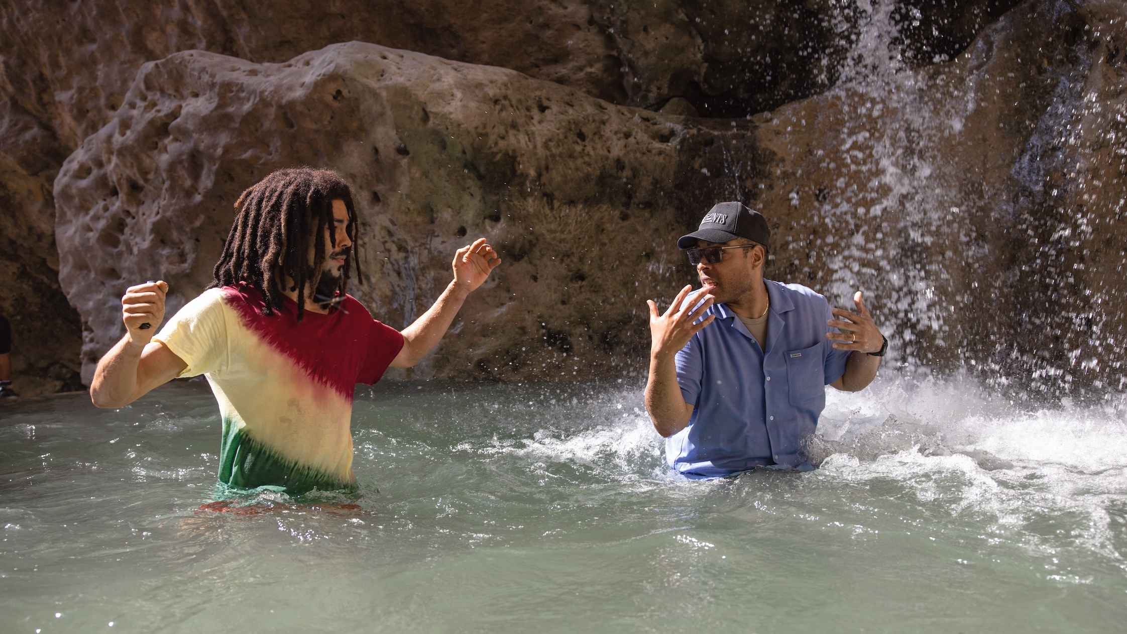 Kingsley Ben-Adir as “Bob Marley” and Director Reinaldo Marcus Green in Bob Marley: One Love from Paramount Pictures.