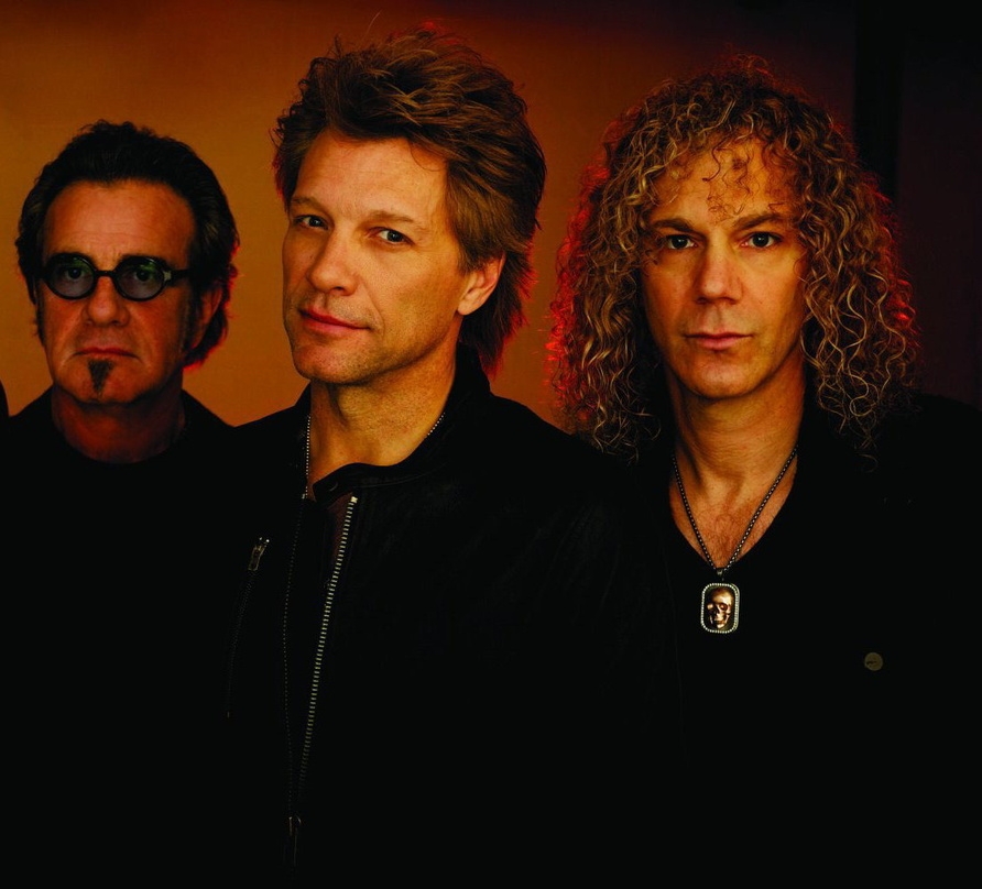 Spielten über drei Stunden lang in München: die drei Gründungsmitglieder von Bon Jovi (von links) Tico Torres, Jon Bongiovi und David Bryan